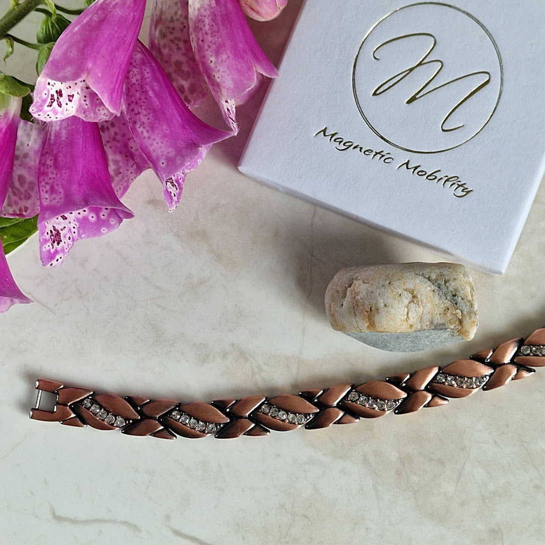 Top view of Kerria - Women's Copper Magnetic link bracelet with crystals