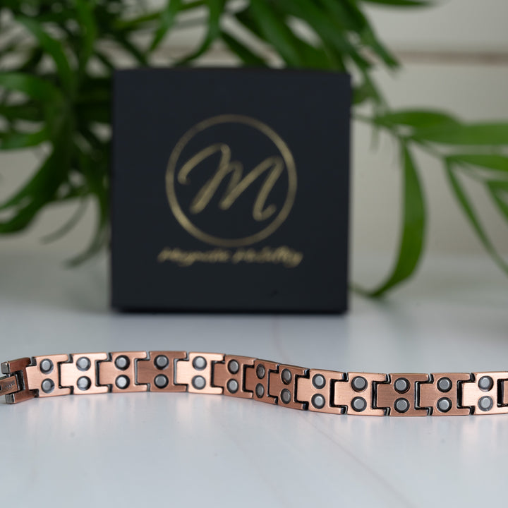 Back view of the Ashe Copper Magnetic Bracelet - Slim style, showcasing the strategically placed double-strength 3000 gauss magnets on every link.