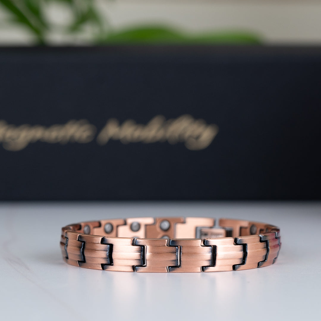 Close-up of the Ashe Copper Magnetic Bracelet - Slim style, focusing on the elegant copper finish and precise link craftsmanship.
