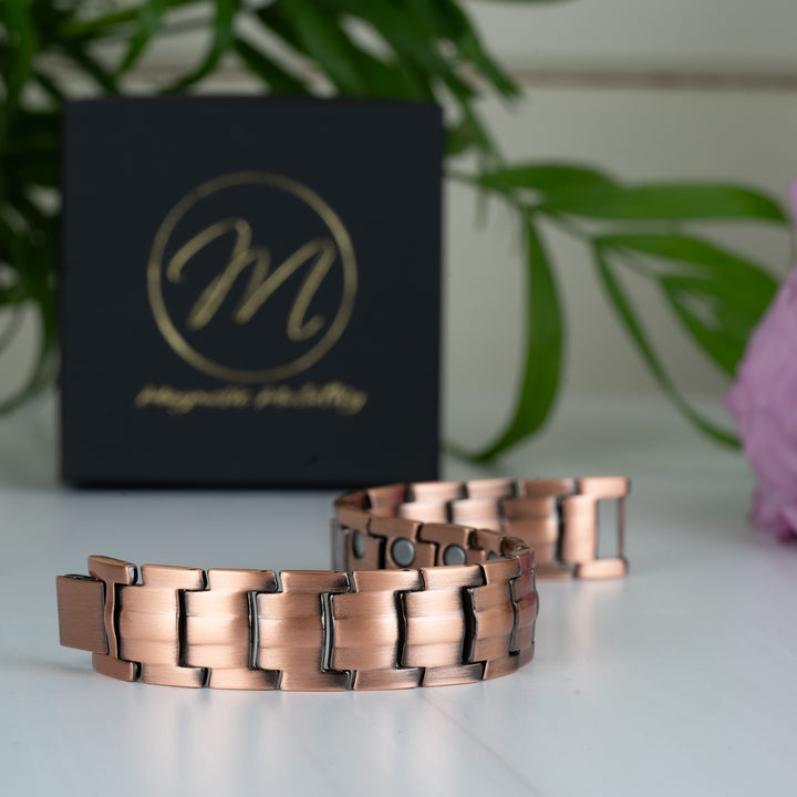 15mm Ashe Copper Magnetic Bracelet - Double Strength arranged in a flexible snake-like shape, highlighting the durable and adjustable design.