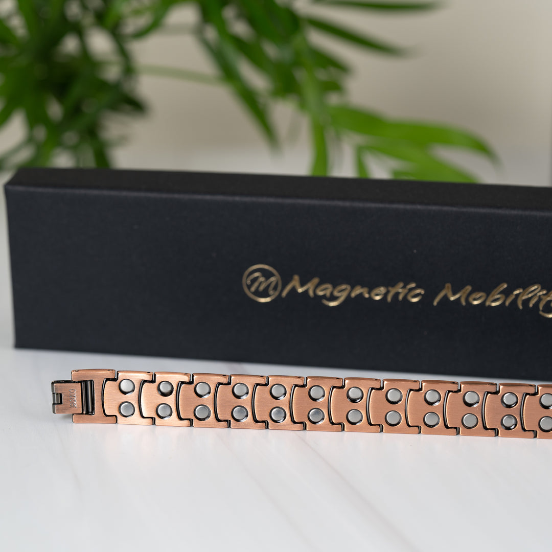 Back view of the Asphodel Copper Magnetic Bracelet standing upright, showcasing its magnets on every link