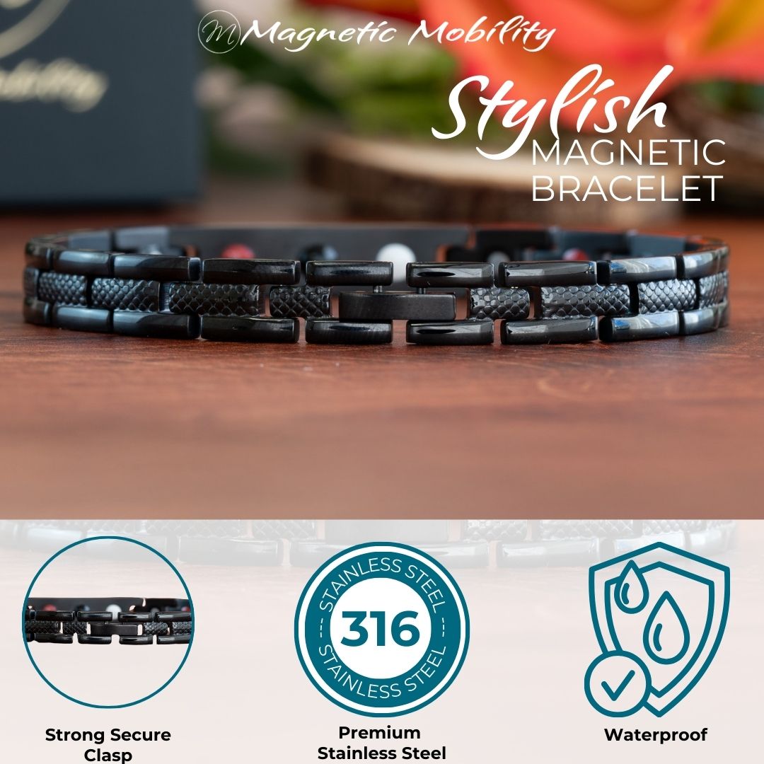 Honesty Night 4in1 Magnetic Bracelet from Magentic Mobility - A black magentic bracelet with a centerpiece, adorned with two rows of shimmering Swarovski crystals. Clasp view - logos depicting stong secure clasp, premium stainless steel and waterproof
