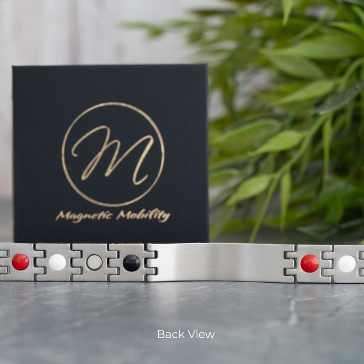 Medical Alert bracelet - back view on a reflective surface, branded 'Magnetic Mobility'.