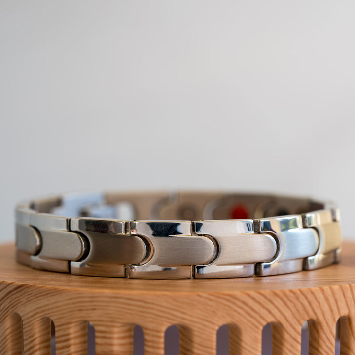 Close-up view of the Rowan Star Men's Silver 4in1 Magnetic Bracelet, highlighting its intricate details, including the embedded magnets and sleek silver finish