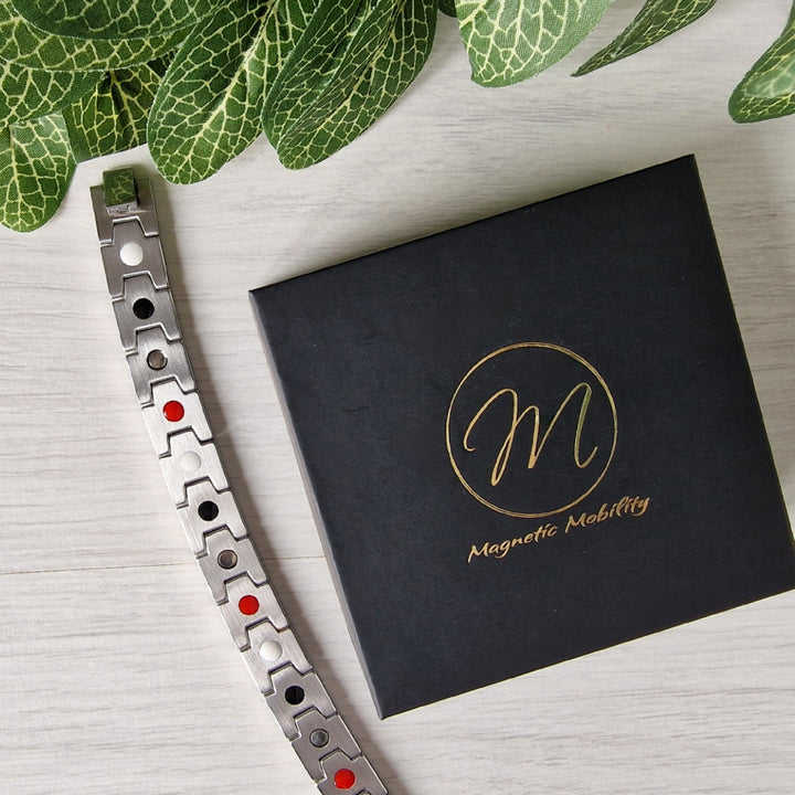 Top-down view of Gentian Star Magnetic Bracelet’s back, displaying the 4in1 elements - Neodymium magnets, Germanium, Negative Ions, and FIR for holistic wellness and arthritis support.