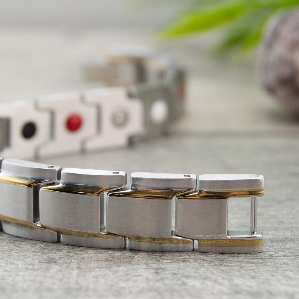 Close up view of Alexanders Moon - Mens Magnetic Bracelet - Silver with Gold Stripes