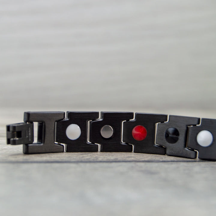 Back view of Alexander Sky Magnetic Bracelet showing the 4 health elements: Negative ions, Far Infrared, Germanium and Magnets.
