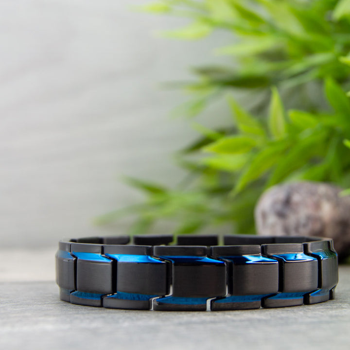 Alexanders Sky - Mens Magnetic Bracelet in Black with Blue Stripes.