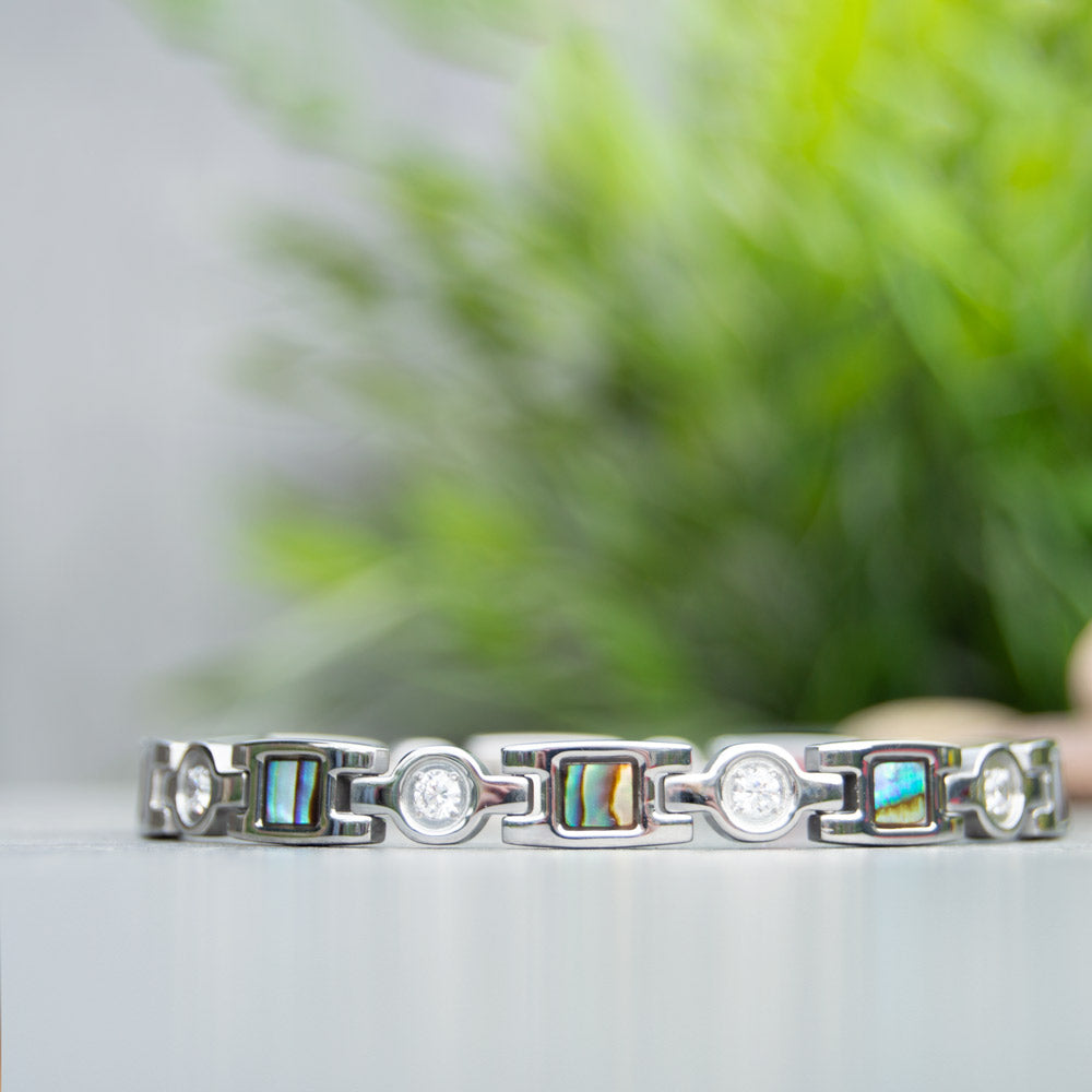 Avens Moon Womens Mangetic Bracelet with irredessant designs and white crystals