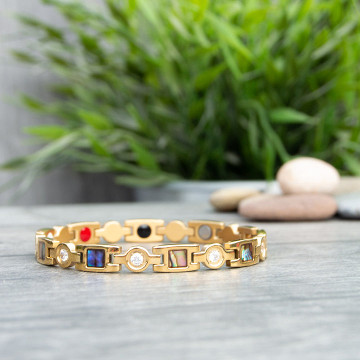Womens Magnetic Bracelet with geometric designs and white crystals from Ireland.