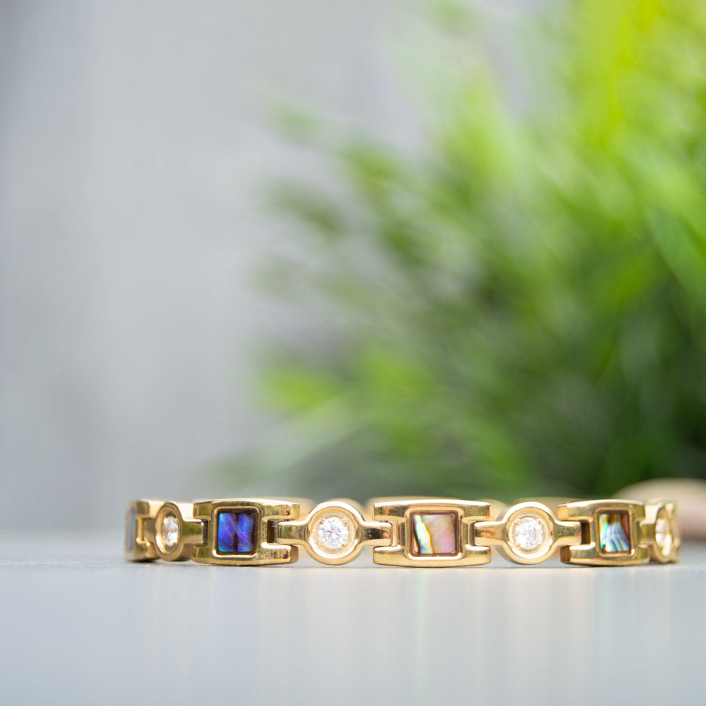 Avens Summer - Gold colour mangentic bracelet for women with contemporary geometric design including white crystals, Contains 4 health elements for Migraine, Back pain etc.