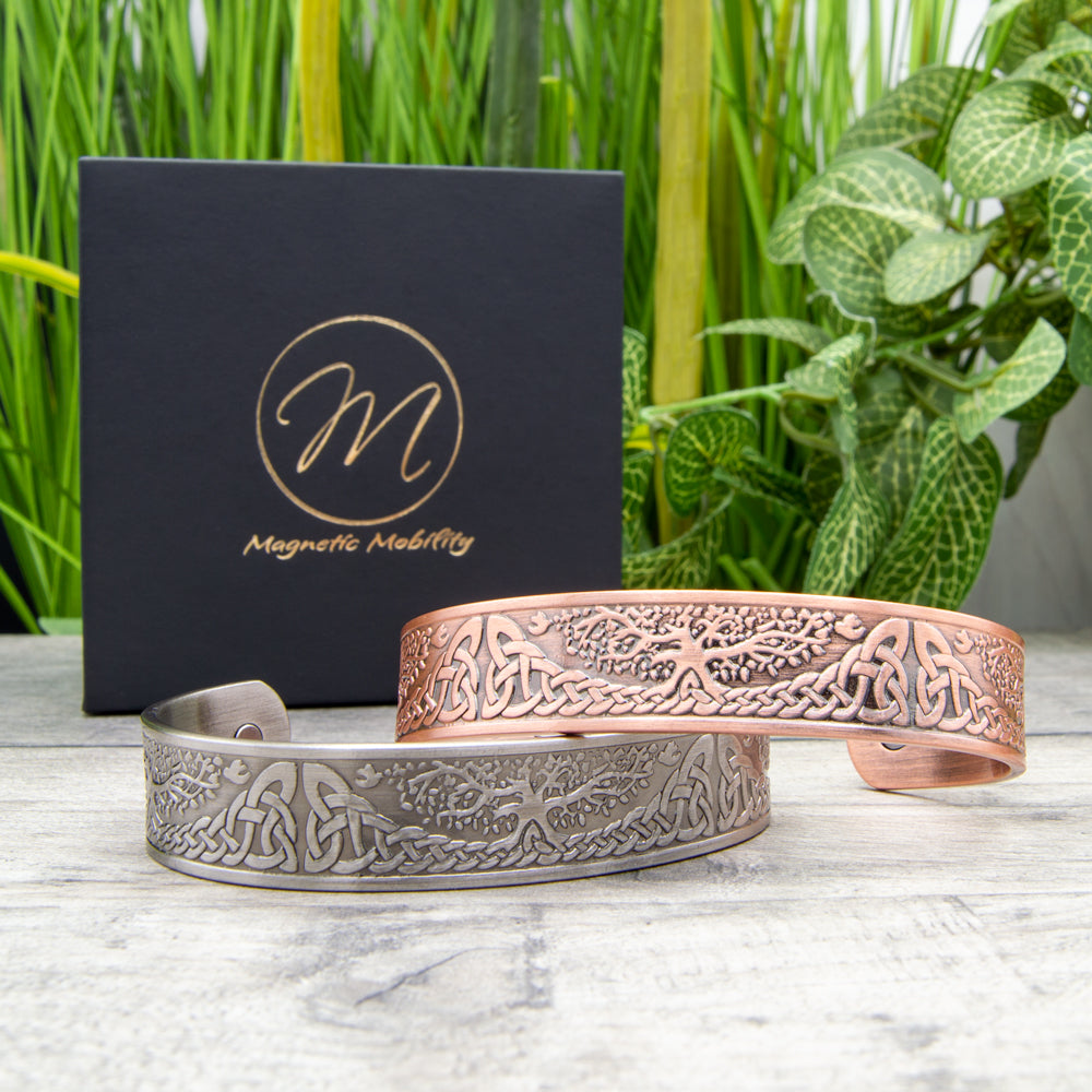 2 Tree of Life Copper bracelets. Both are Magnetic copper bracelets with 6 strong magnets. One is a silver plated copper bracelet with a tree of life design, the other is a pure copper bracelet with a tree of life design.