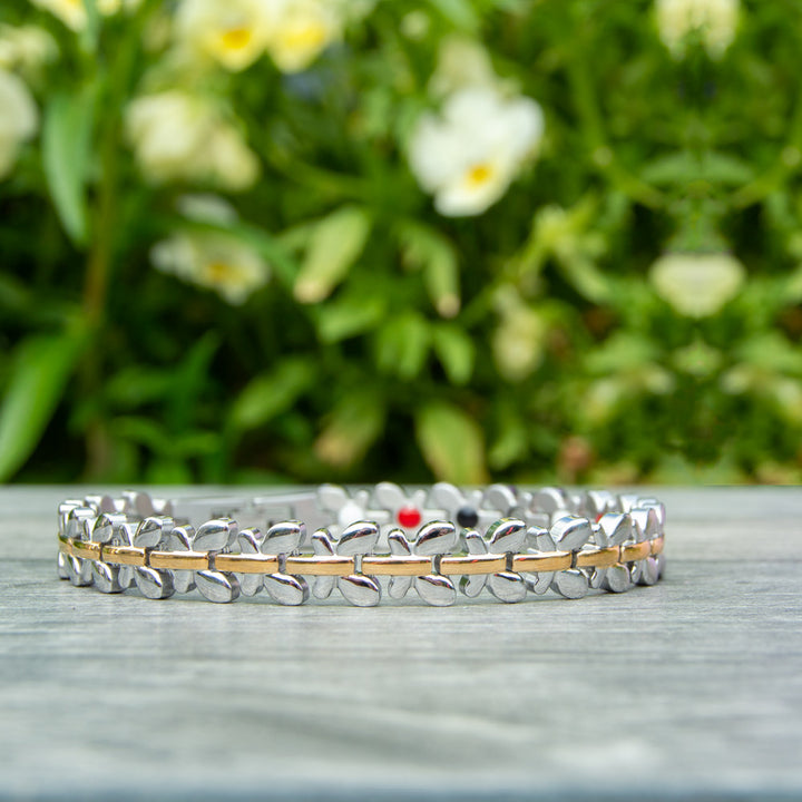 Front view of Buddleia Twighlight - Silver and Gold Coloured Womens Magnetic Bracelet with Butterfly Designs