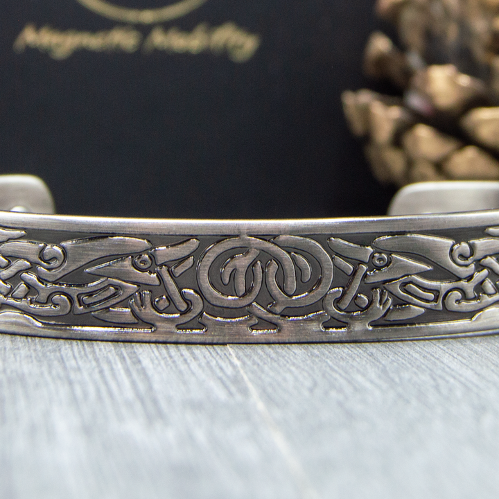 Close up view of Mens Copper Bracelet with Magnets  - in Silver Colour. Intricate Irish designs are shown on the front of the copper bracelet