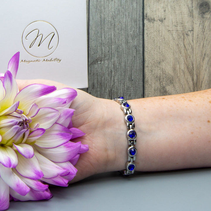 December Birthstone on womans wrist - with 4in1 Health Element Magnetic Bracelet for Women