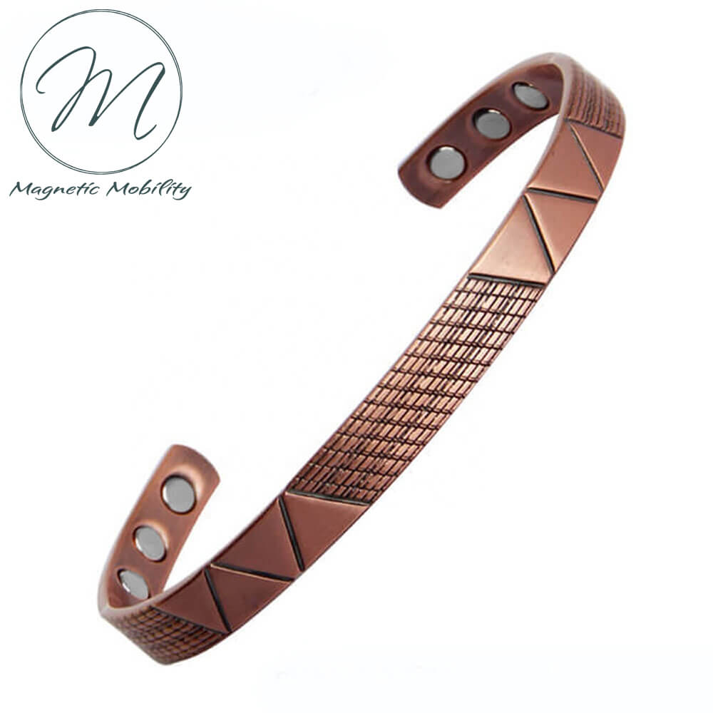 Front view - Geometric designs on a Copper bracelet. Contains  99.9% pure Copper,  and 6 x 3000 gauss Neodymium Magnets