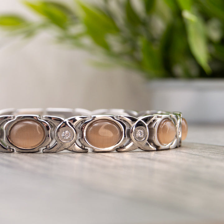 Silver colour Magnetic Bracelet with Opals and white crystals. Contains 4 health elements for women with arthritis, back pain, migraine etc.