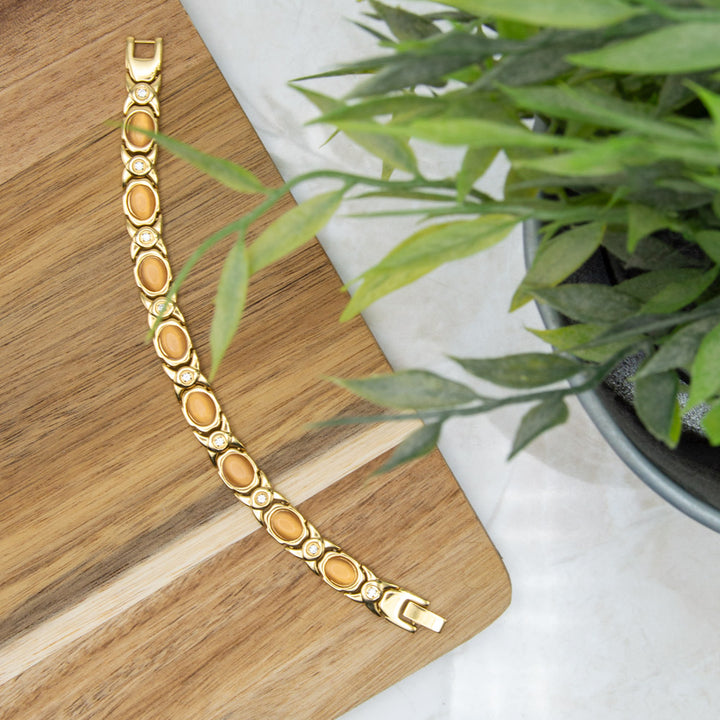 Gold Womens Magnetic Bracelet with Opals and white cyrstals - Top view