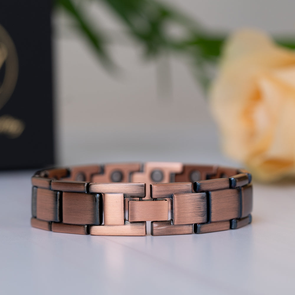 Close-up view of Alexander's Copper Double Strength Magnetic Bracelet clasp, showcasing its high-quality copper finish and sleek design.