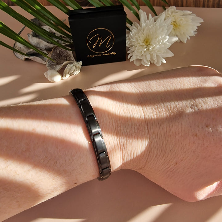 Apia Night 4in1 Magnetic Bracelet from Magnetic Mobility - Thin black magnetic bracelet - on a wrist