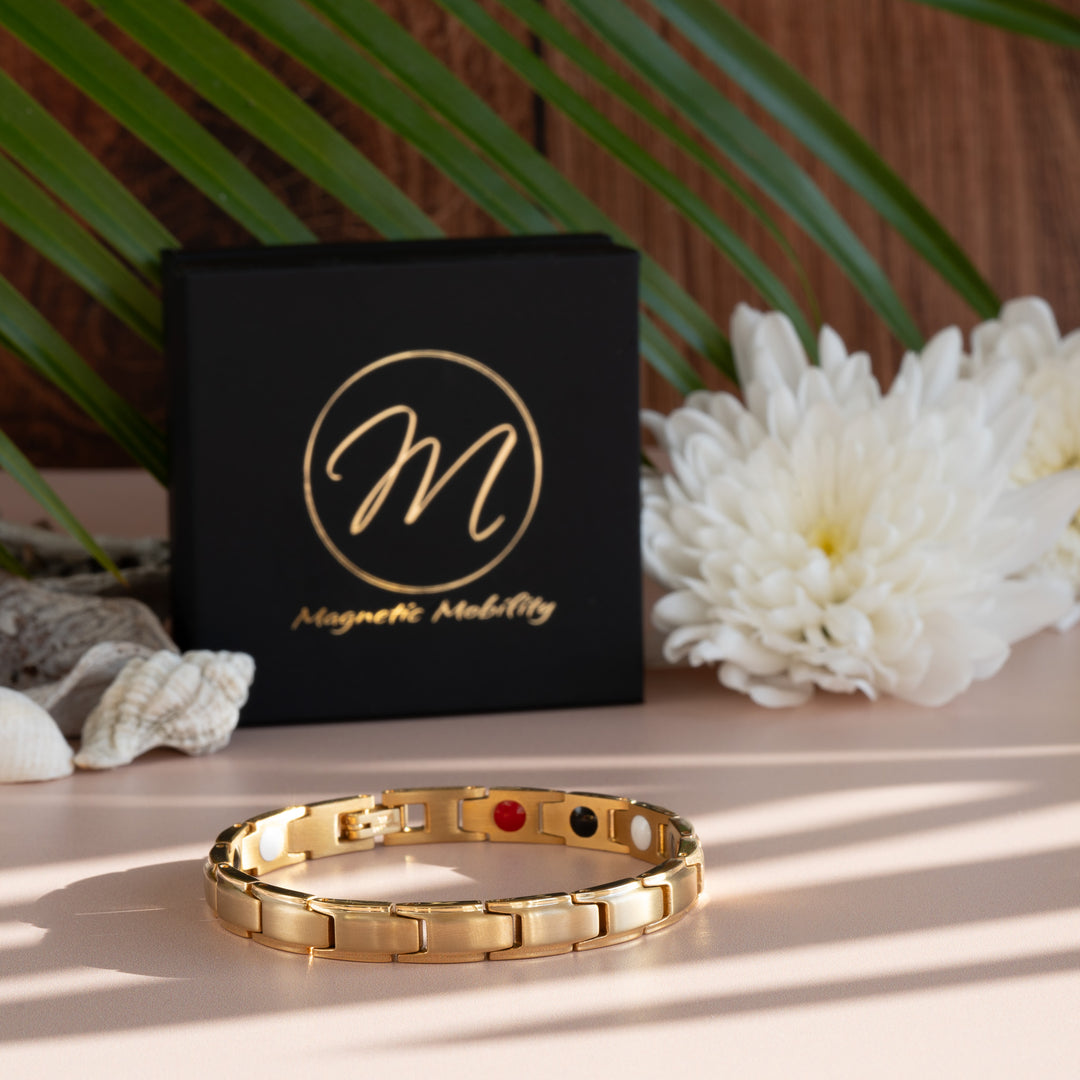 Apia Sun 4in1 Magnetic Bracelet from Magnetic Mobility - a thin gold magnetic bracelet - 45 degree view