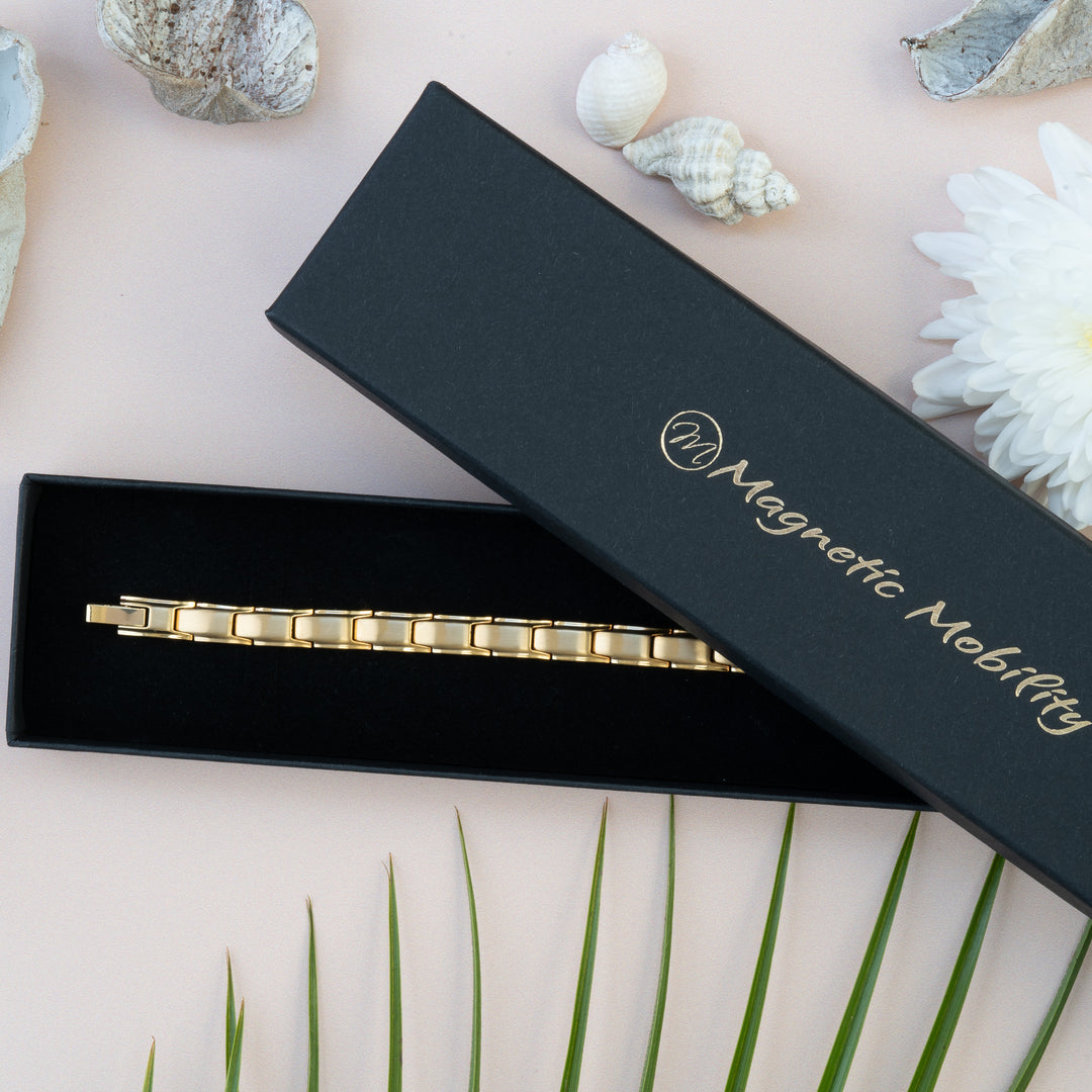 Apia Sun 4in1 Magnetic Bracelet from Magnetic Mobility - a thin gold magnetic bracelet - in a black gift box