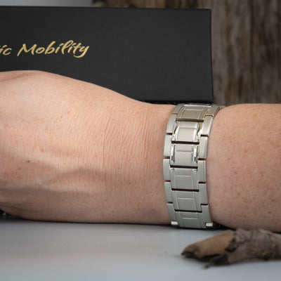 Birch Star 4in1 Men's Bracelet worn gracefully on a slim wrist, encapsulating comfort and modern sophistication.