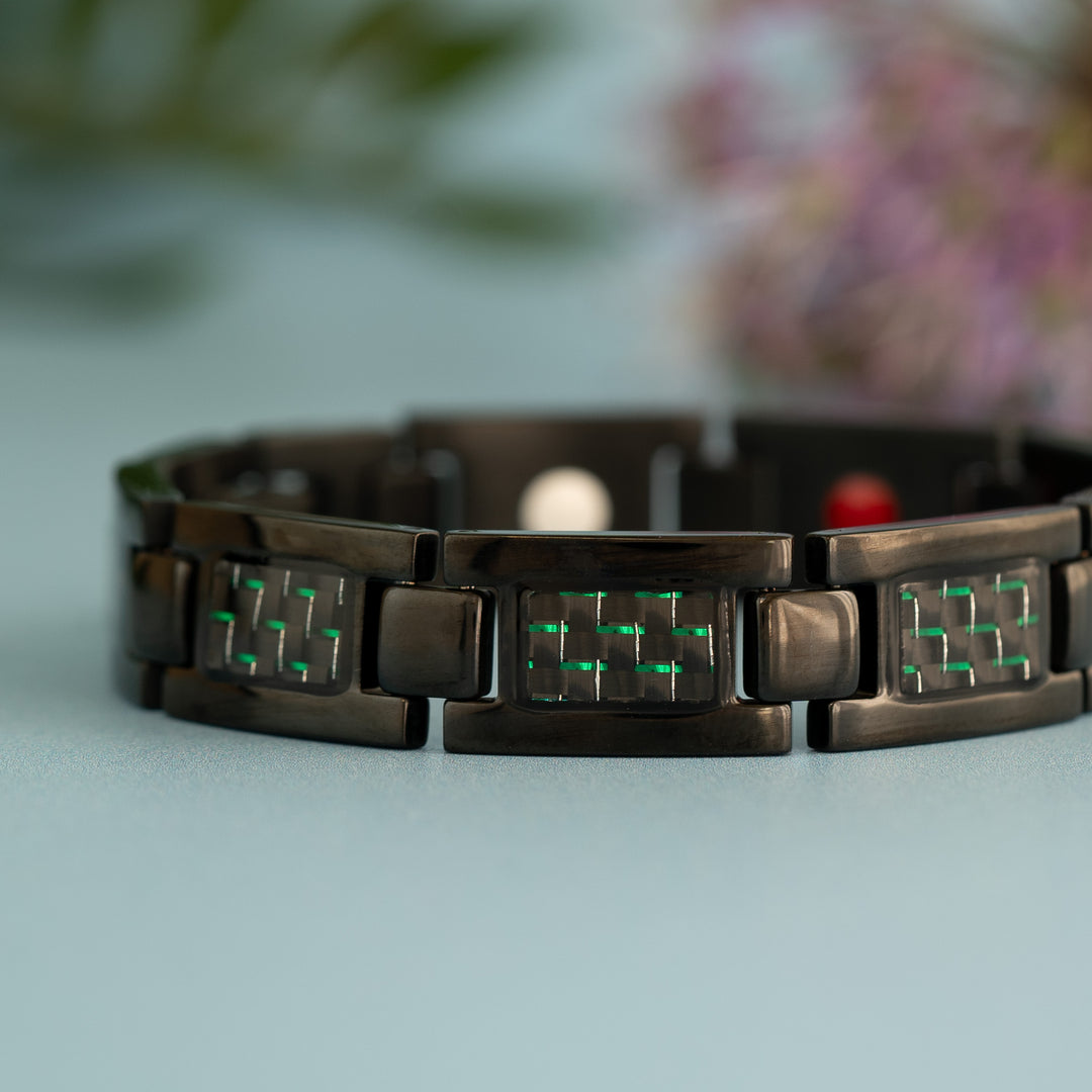 Close up view of Earth 4in1 Magnetic Bracelet from Magnetic Mobility - Mens Black Magnetic bracelet with Green designs