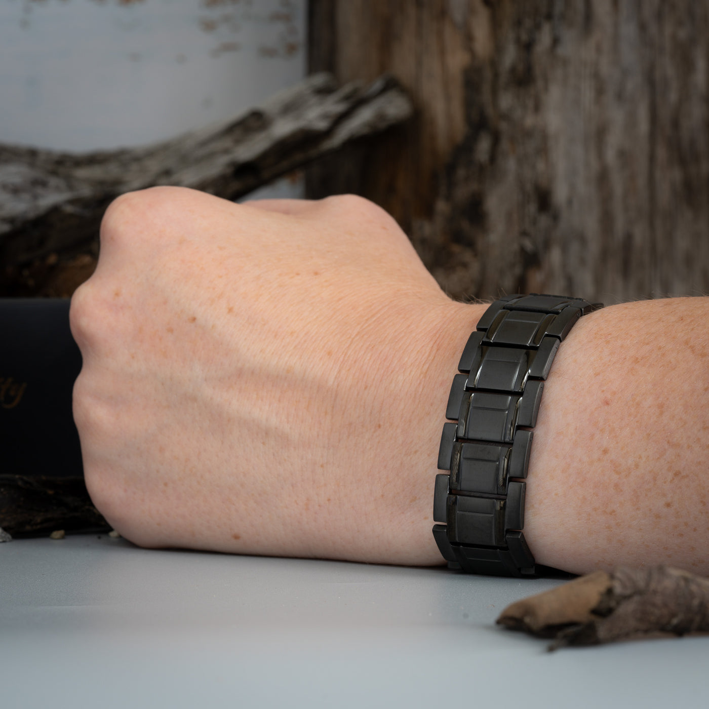 The Birch Night Men's 4in1 Magnetic Bracelet worn on a slim wrist, displaying its fit and style. A testament to comfort and elegance.
