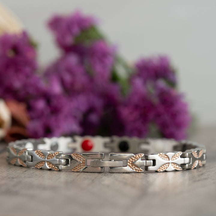 Clasp view of the Meadowsweet Dusk 4in1 Magnetic Bracelet, showing its intricate butterfly design in silver and rose gold.