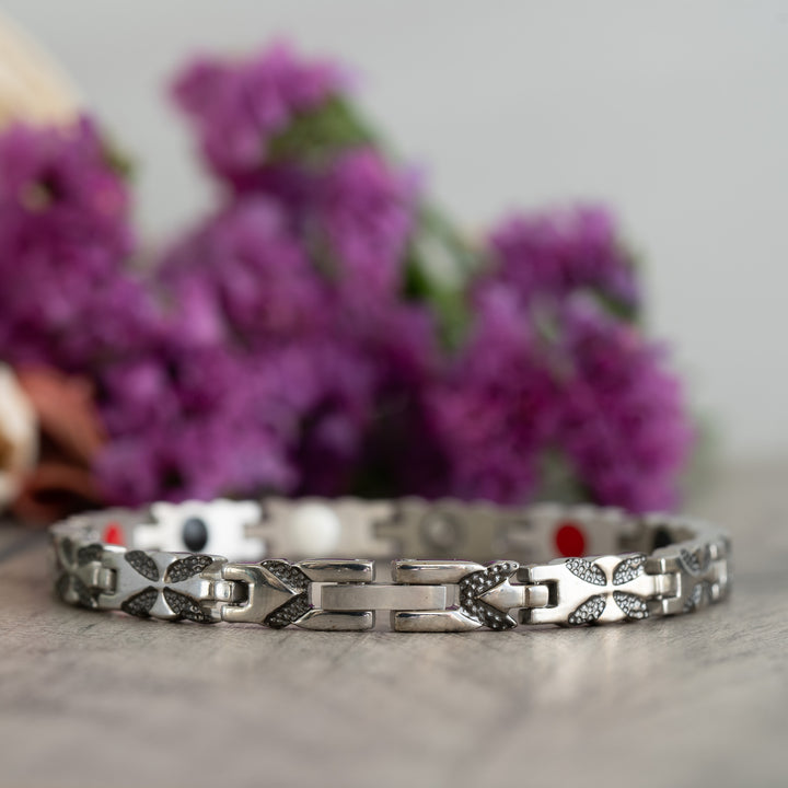 Clasp view of the Meadowsweet Night 4in1 Magnetic Bracelet, highlighting its silver and black butterfly design and advanced health elements for arthritis relief.