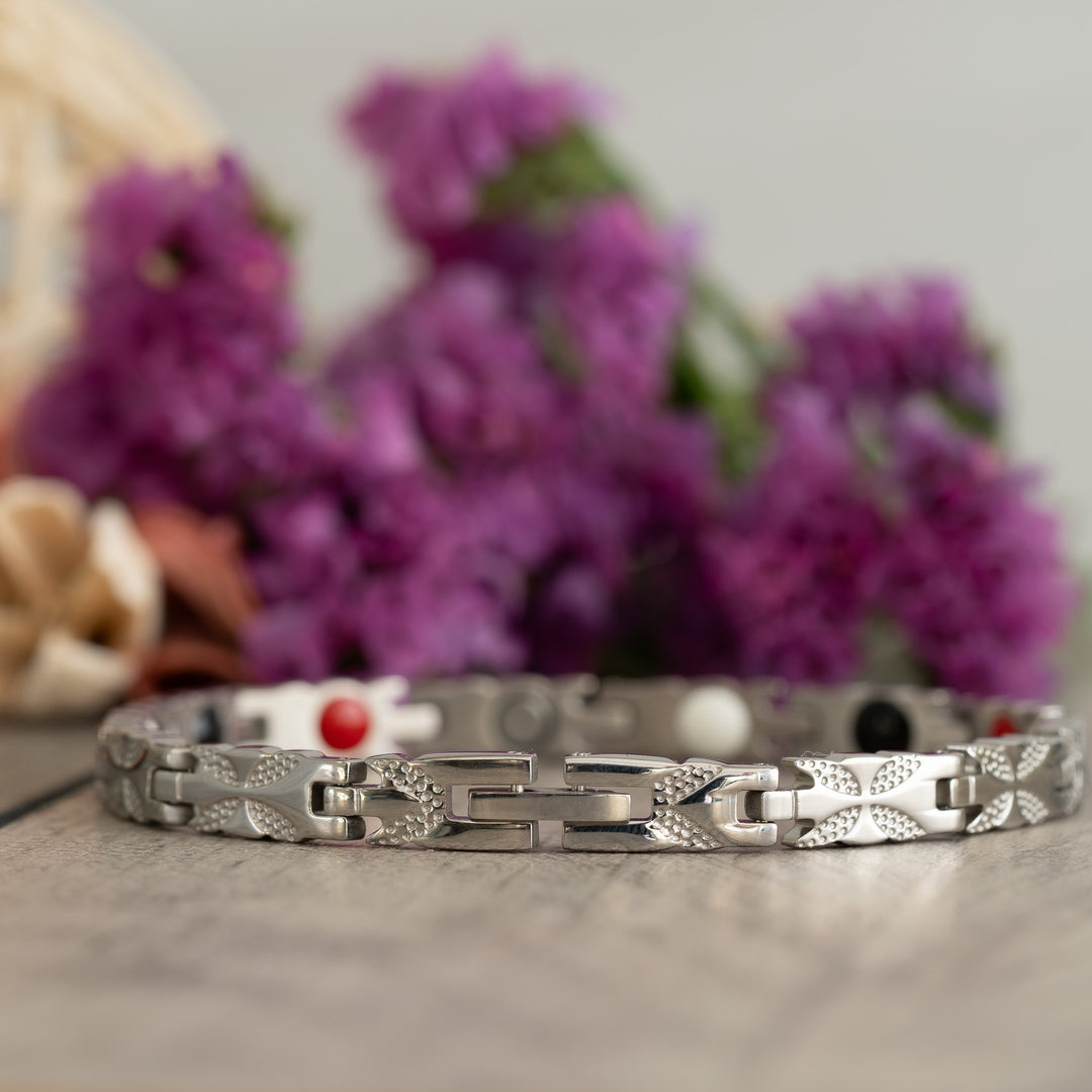 Close-up of the clasp detail on the Meadowsweet Star 4in1 Magnetic Bracelet by Magnetic Mobility. The sleek and secure design enhances comfort while featuring four powerful therapy elements for arthritis, back pain, and joint support. Elegant silver butterfly design paired with functionality.