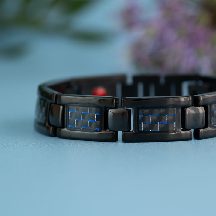 Close up view of Water 4in1 Magnetic Bracelet from Magnetic Mobility - Mens Black Magnetic bracelet with Blue designs