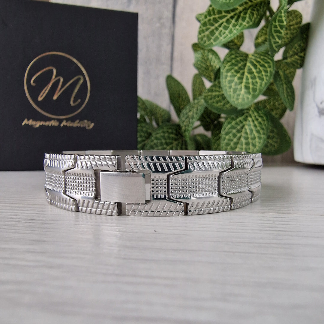 Gentian Star 4in1 Magnetic Bracelet in Silver plated Stainless Steel with a distinctive tire-tread design for arthritis relief.