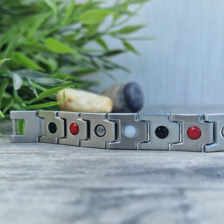 Back view of Alexanders Star - Men's 4in1 Magnetic Bracelet, showcasing the four elements: Negative ions, FIR elements, Neodymium magnets, and Germanium. Explore our blog for a deeper understanding of how these elements aid in managing conditions like Arthritis, back pain and more