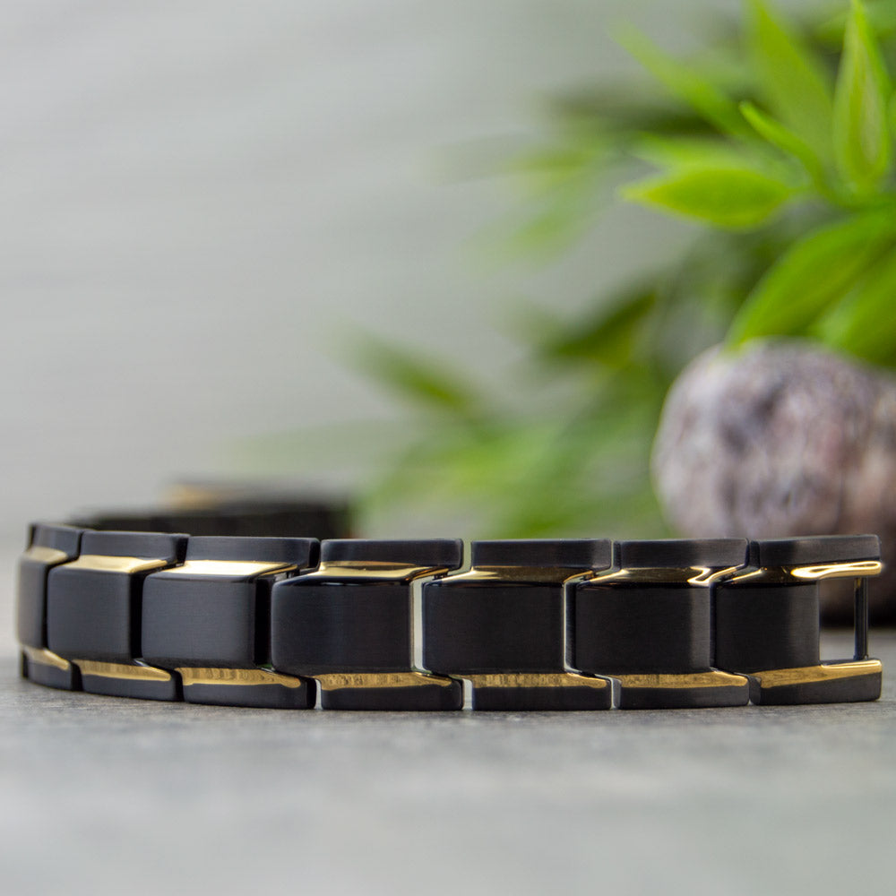 Front view of Alexanders Dawn - Mens Magnetic Health Bracelet  - Black with Gold Stripes