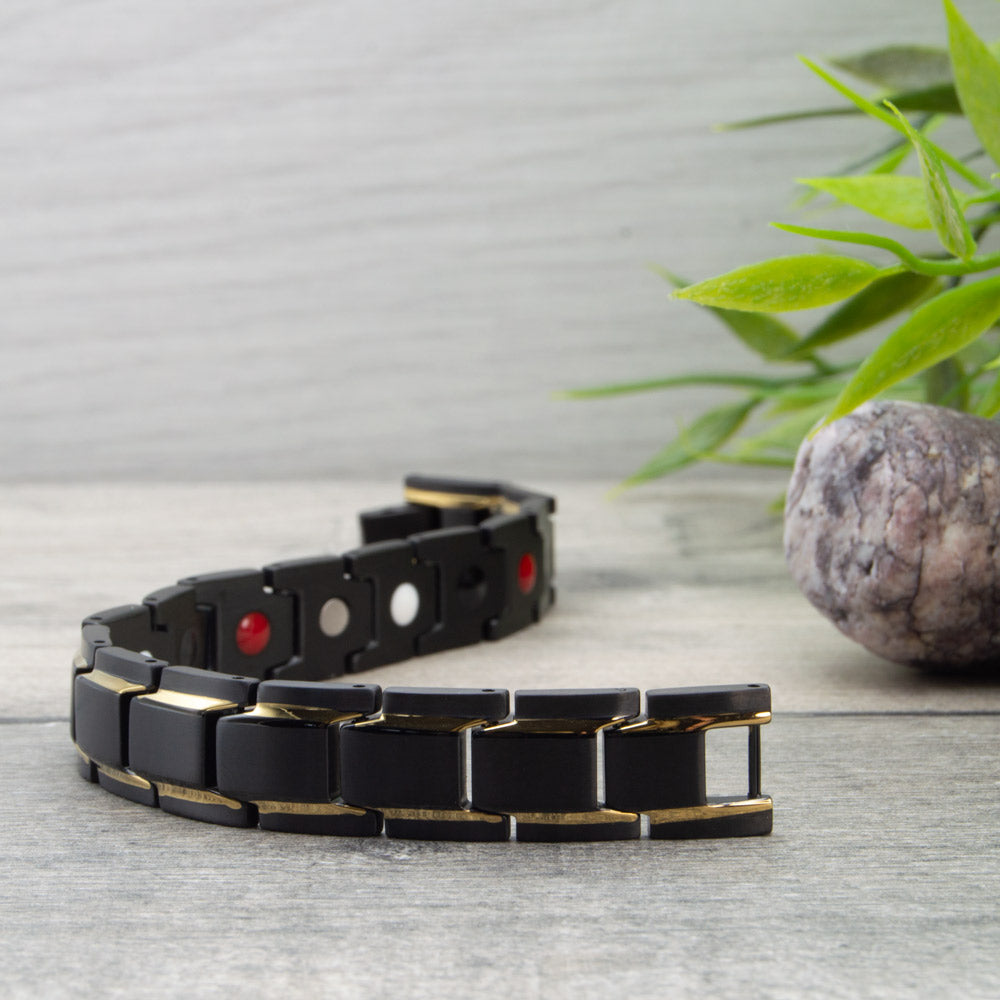View showing both the front and the back of Alexanders Twilight - Mens Magnetic Health Bracelet with in Black with Gold Stripes. 