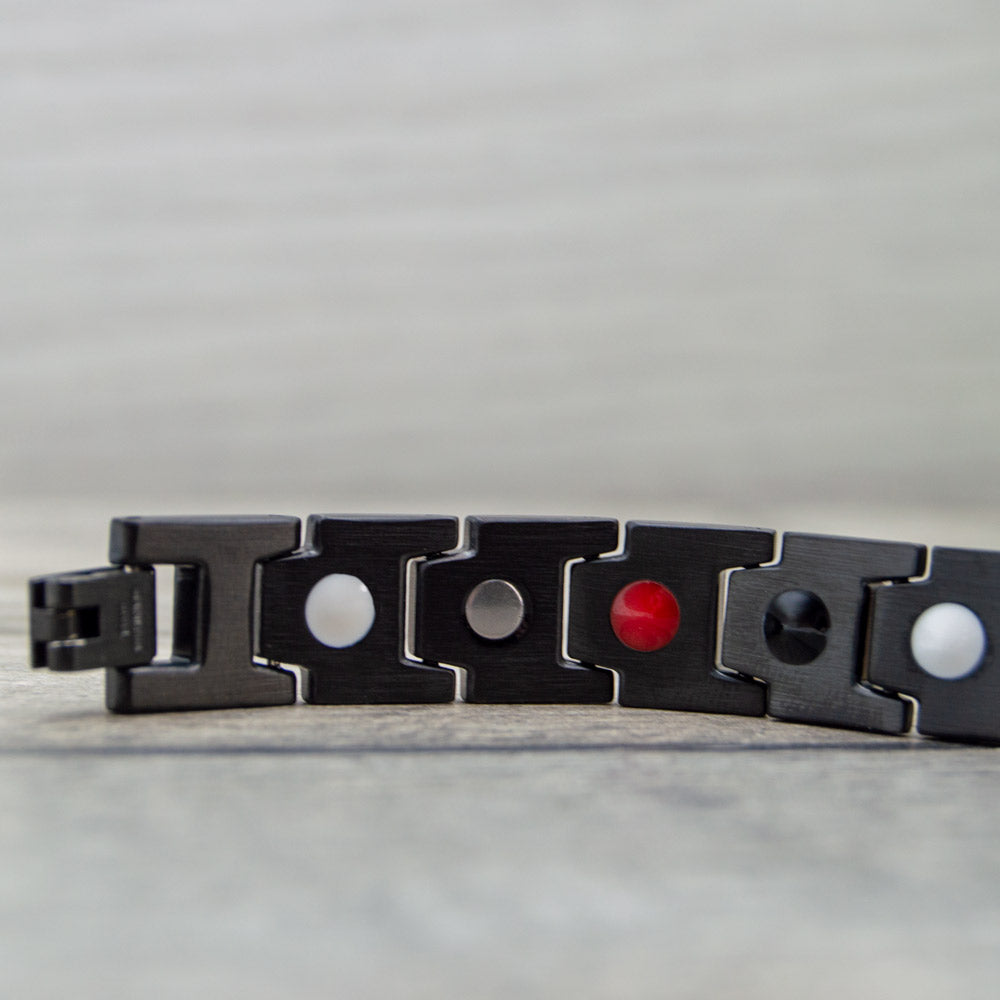 Back view of Alexander Sky Magnetic Bracelet showing the 4 health elements: Negative ions, Far Infrared, Germanium and Magnets. 