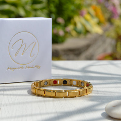Unisex gold coloured Magnetic bracelet - simple slim design with 4in1 Health Elements. 