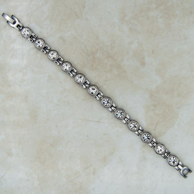 Top view of Magnetic Mobility April Birthstone bracelet with 4 health elements in the back of this magnetic bracelet 