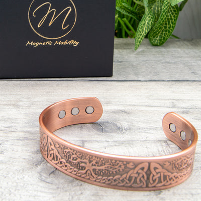 Close-up image highlighting the robust neodymium magnets in the thick Buckthorn Copper Bracelet, for arthritis and pain 