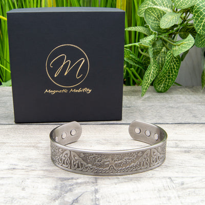 Captivating 45-degree view of the silver-plated Buckthorn Copper Bracelet highlighting the embedded magnets, a stylish choice for arthritis and pain relief seekers.
