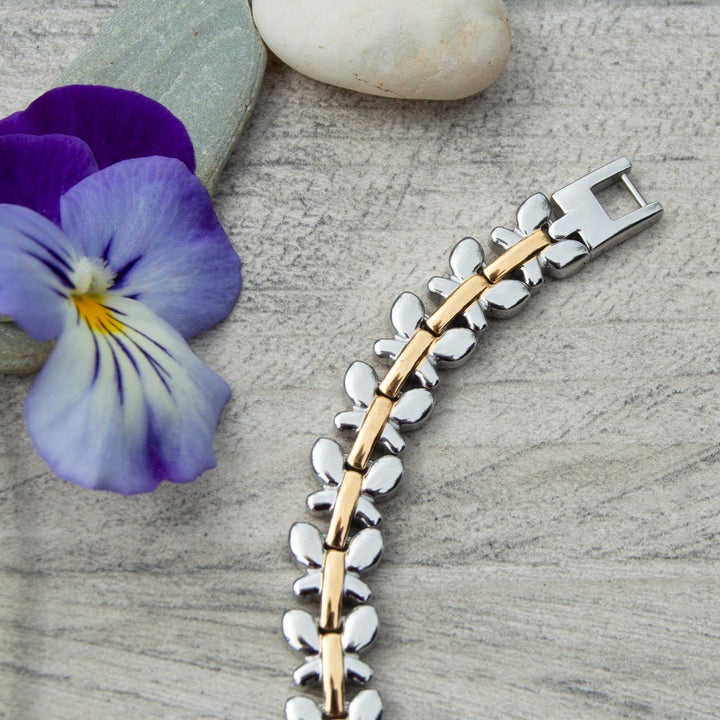 Top view of Buddleia Twighlight Magnetic Bracelet.  Silver and Gold Butterfly Designs