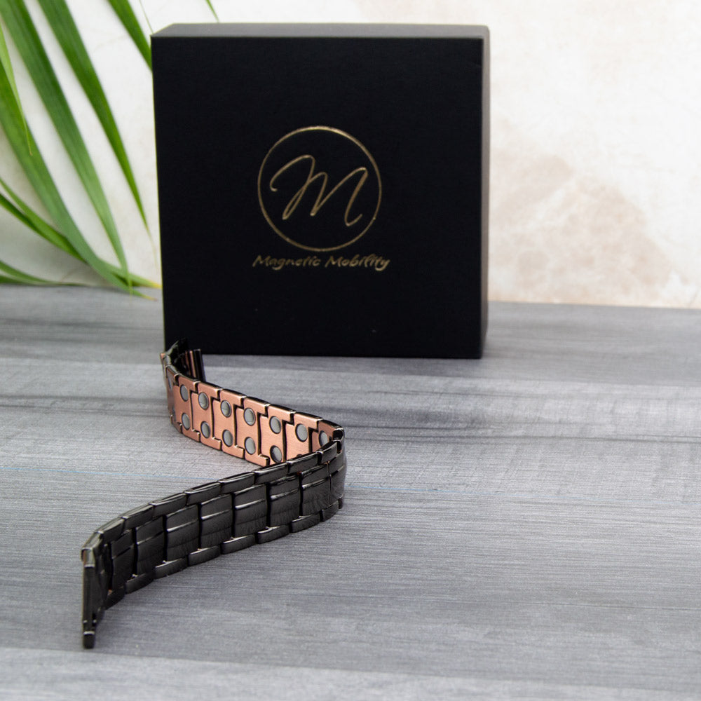 View showing Charlock Mens Copper Bracelet at an angle - shows front and back of the bracelet. 