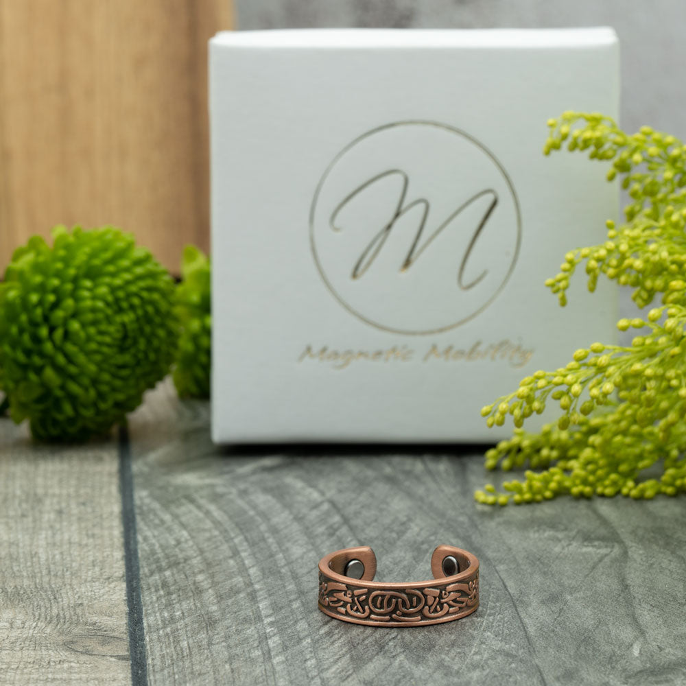 The Clover Copper ring features a Celtic design and contains Neodymium Magnet Therapy (NMT) for natural pain relief from arthritis in the hands. With Eco-friendly gift box