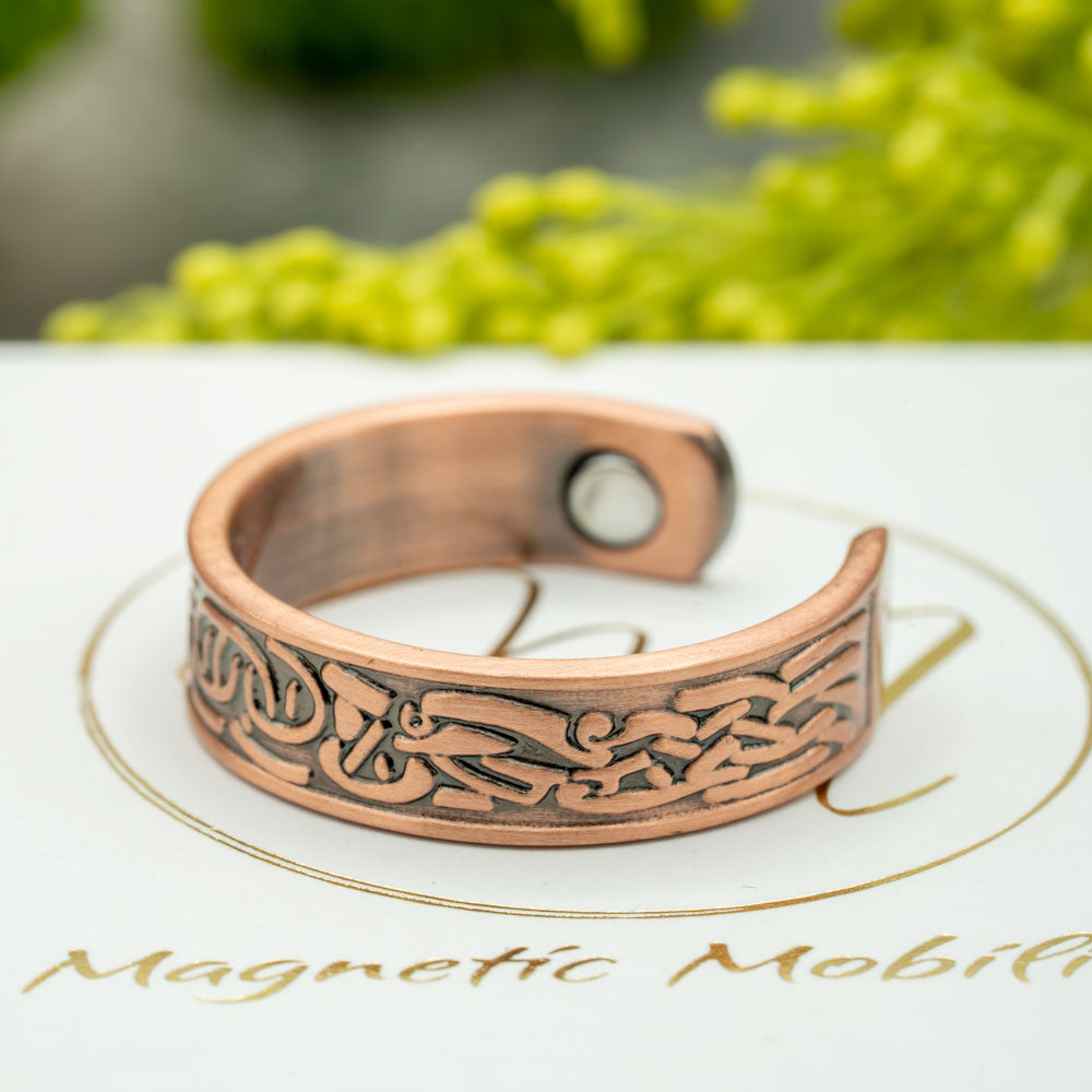 Close up view of magnets in Clover copper ring