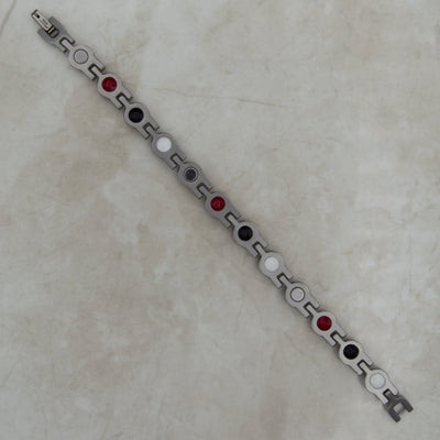 Back view of Magnetic Mobility April Birthstone magnetic bracelet showing the 4 health elements - germanium, neodynium magnets, FIR elements and Negative ions
