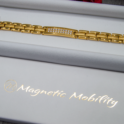 Women's Magnetic Bracelet with 4 Health Elements - Gold Colour with White Diamonte crystals - Top view of bracelet in Luxury White Gift Box