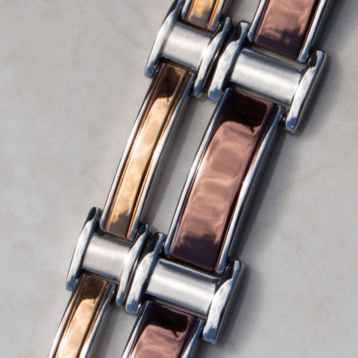 Close up Top view of Illyrian Dawn Magnetic Bracelet’s metallic beige-brown pattern in Silver-plated Stainless Steel, an accessory. Thick and thin styles available