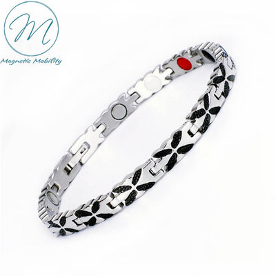 Magnetic Bracelet in Silver with black butterfly like designs. Help relieve arthrits pain. 